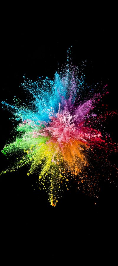 multi-color powder  explosion on black background.